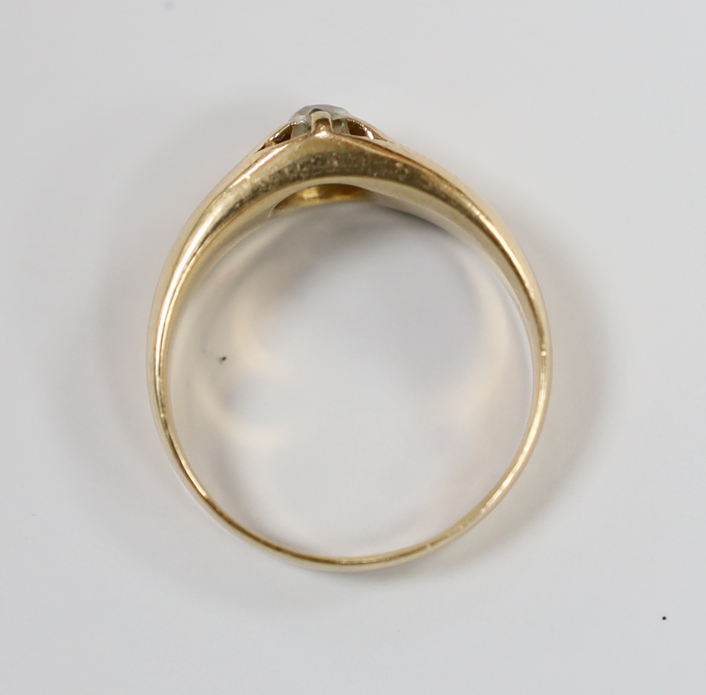 A late Victorian 15ct gold and claw set solitaire diamond ring, size Q, gross weight 5.5 grams.